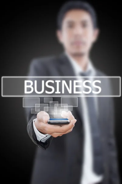 Бізнесмен проведення бізнес слово з мобільного телефону. — Stock Fotó