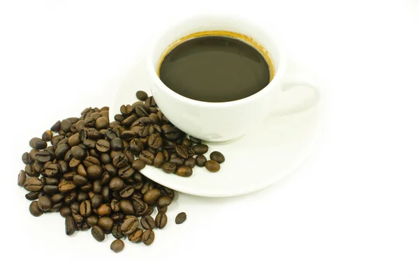 Xícara de café e grãos de café. — Fotografia de Stock
