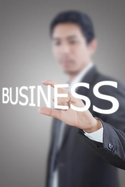 Negócio empresário asiático palavra de sucesso em uma interface de tela de toque — Fotografia de Stock
