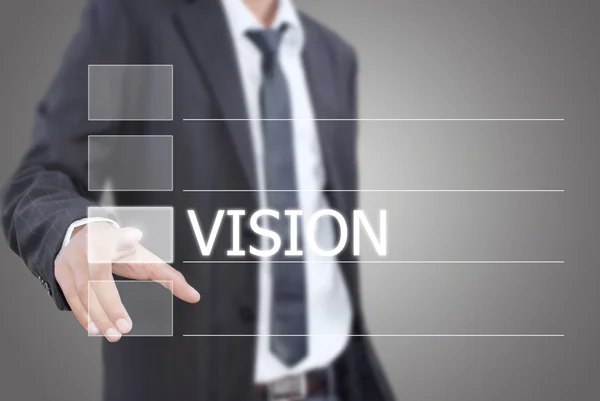 Hombre de negocios asiático empujando palabra de visión en una interfaz de pantalla táctil — Foto de Stock