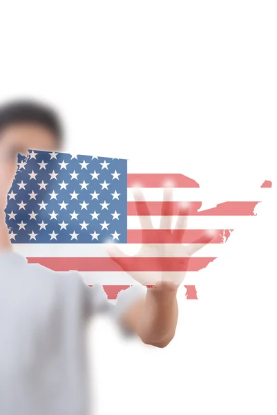 Asiatischer Mann schiebt US-Flagge. — Stockfoto
