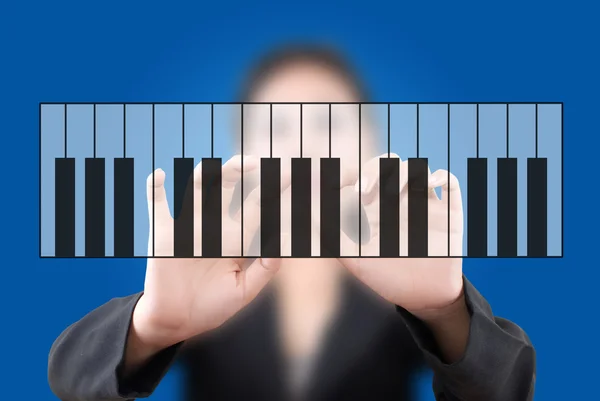 Ásia negócios senhora empurrando teclado piano — Fotografia de Stock