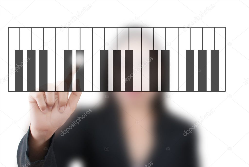 Asian business lady pushing keyboard piano