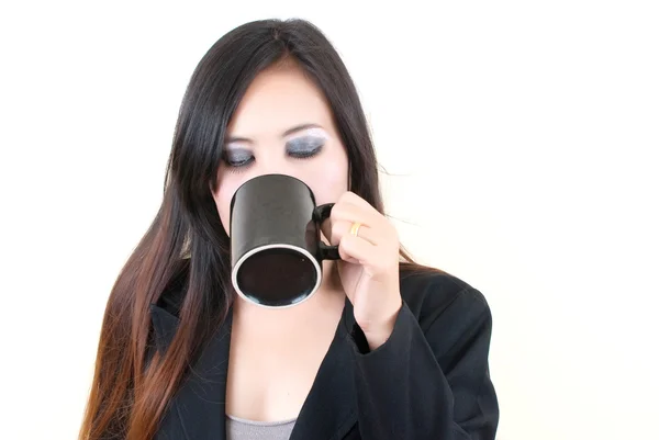 stock image Business Asian lady putting coffee cup