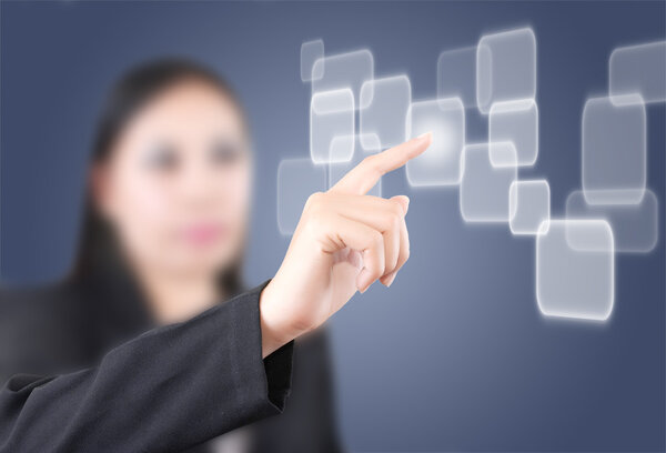 Asian business lady pushing button on the whiteboard