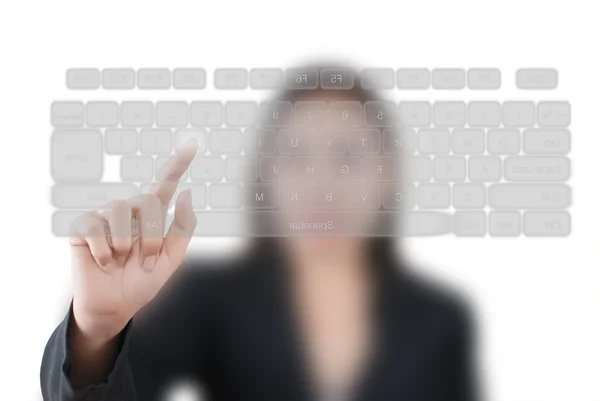 Business lady pressing transparent keyboard — Stock Photo, Image