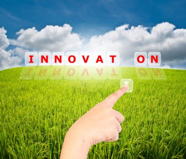 Hand pressing I for innovation word on the blue sky in the monitor isolate. clipart