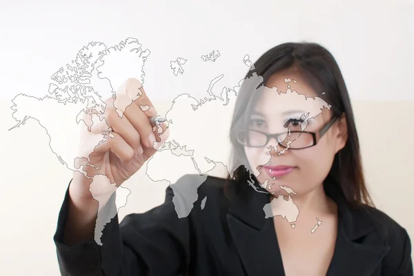 Business lady pressing on the world map. — Stock Photo, Image