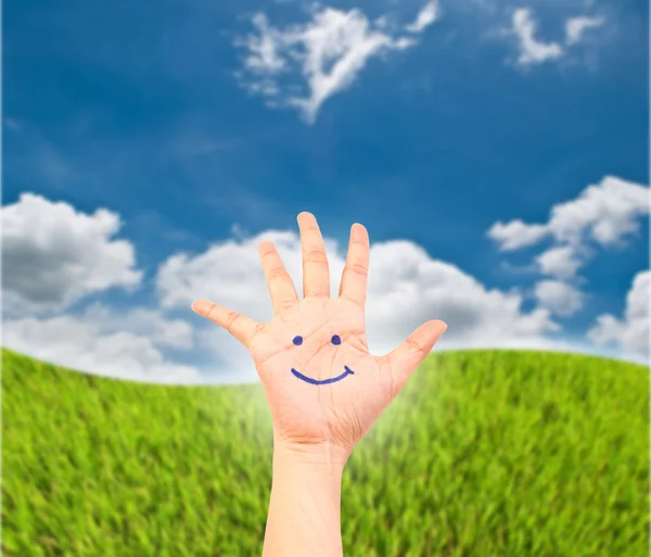Smile on the hand for happy concept. — Stock Photo, Image
