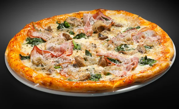 Pizza with ham, mushrooms, spinach — Stock Photo, Image