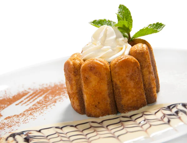Traditional Italian dessert tiramisu on white plate — Stock Photo, Image