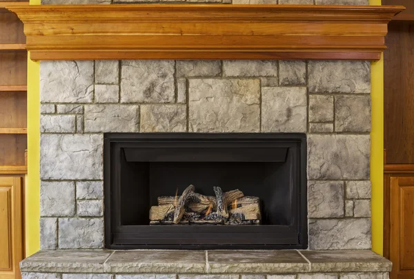 Natural Gas Insert Fireplace with Stone and Wood — Stock Photo, Image