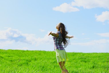 Woman on summer green field feel freedom clipart