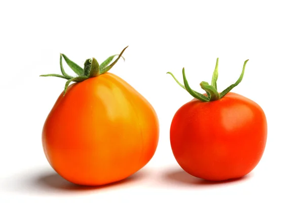 Roter Tomatenstapel auf weißem — Stockfoto