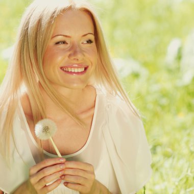 Girl with dandelion clipart