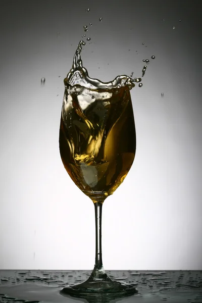 Alkohol splash — Stock fotografie