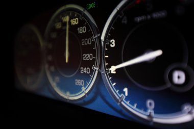 Speedometer in car close up clipart