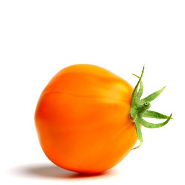 Orange tomato on white clipart