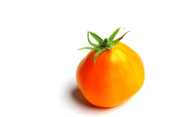 Orange Tomate auf weiß — Stockfoto