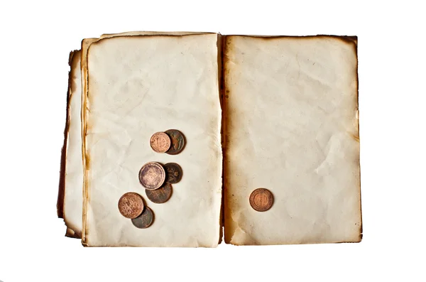 Livro velho com moedas de cobre — Fotografia de Stock