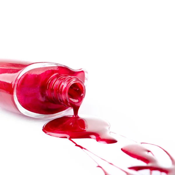 Esmalte de uñas rojo sobre fondo blanco aislado —  Fotos de Stock