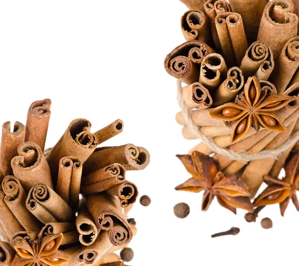Cinnamon and anise on isolated white background — Stock Photo, Image