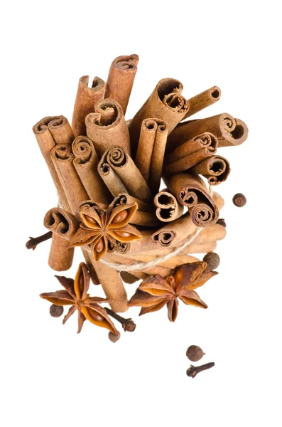 Cinnamon and anise on isolated white background — Stock Photo, Image