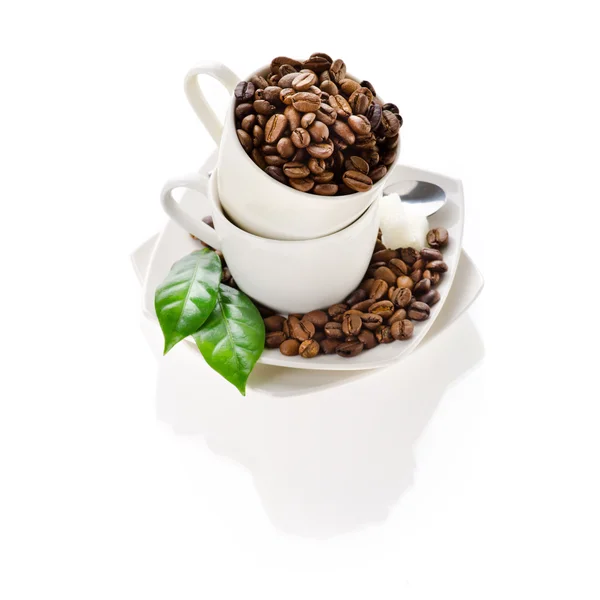 Wenige Tassen Kaffee auf isoliertem weißem Hintergrund — Stockfoto