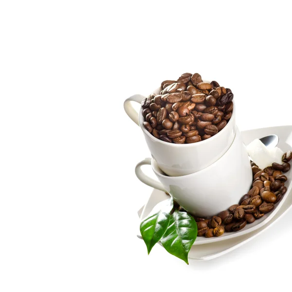 Pocas tazas de café sobre un fondo blanco aislado — Foto de Stock