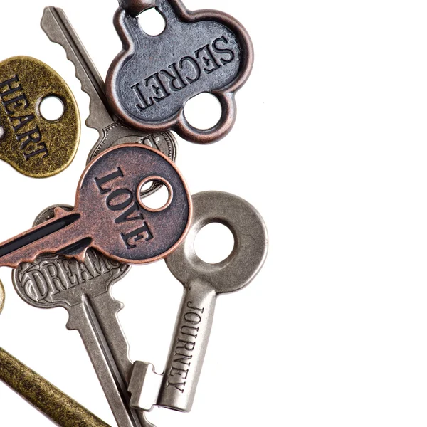 Vintage keys on isolated white background — Stock Photo, Image
