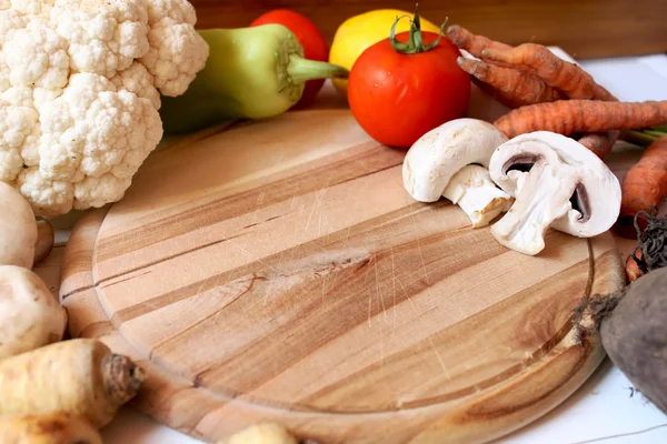 Wood and vegetables — Stock Photo, Image