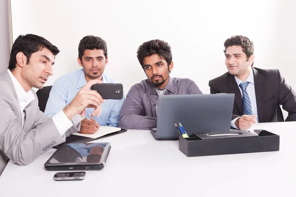 Businessman giving presentation to his colleagues — Stock Photo, Image