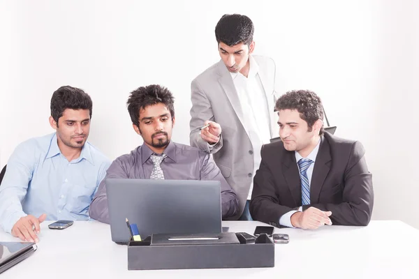 Businessman giving presentation to his colleagues — Stock Photo, Image
