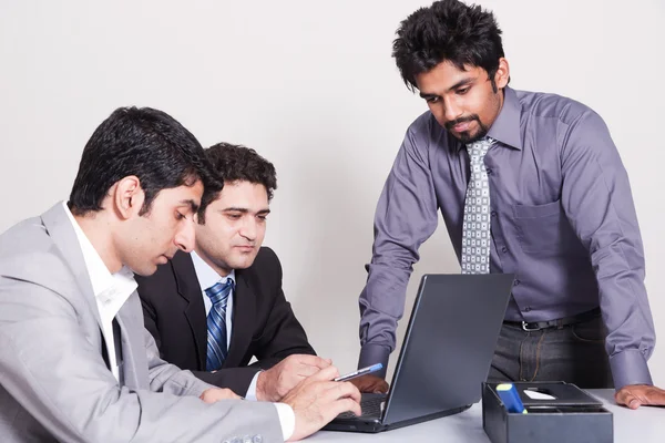 Três empresários em uma reunião — Fotografia de Stock