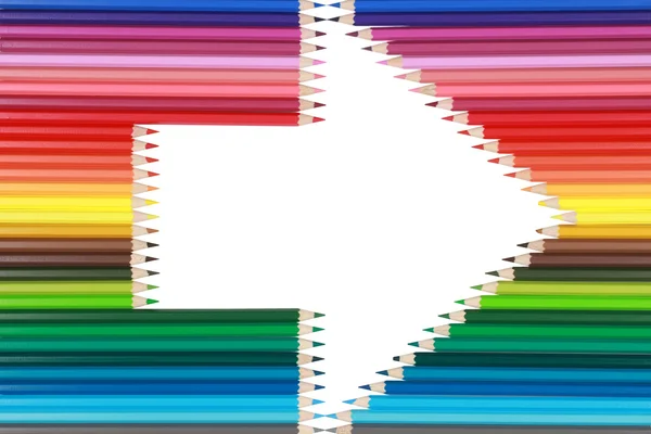 Crayons forming an arrow — Stock Photo, Image