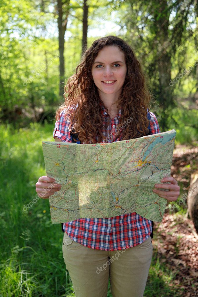 Hiker is reading a map Stock Photo by ©Boarding2Now 11739480