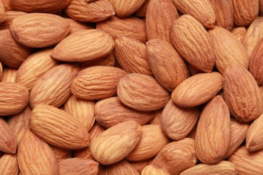 Almonds form a background clipart