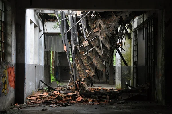 Collapsed roff Inside factory ruin — Stock Photo, Image