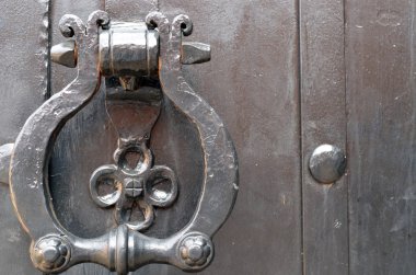 Vintage metal door handle. Ancient architecture clipart