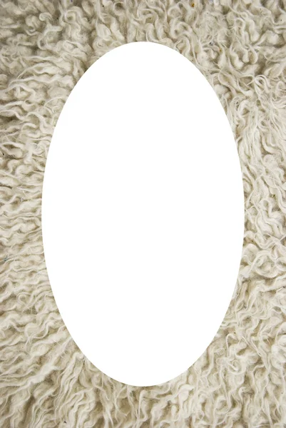 Isolated white oval in mat made of wool — Stock Photo, Image