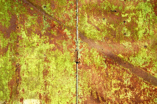 Background of old rusty steel garage door hinge — Stock Photo, Image