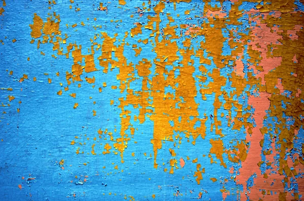 Background of peeling paint wall painted colors — Stock Photo, Image