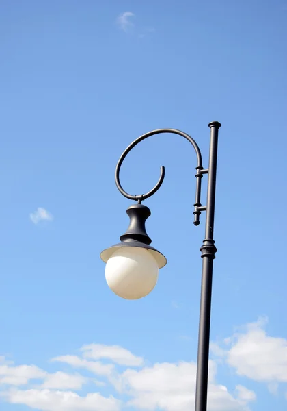 Park round light lamp on pole on background of sky — Stock Photo, Image