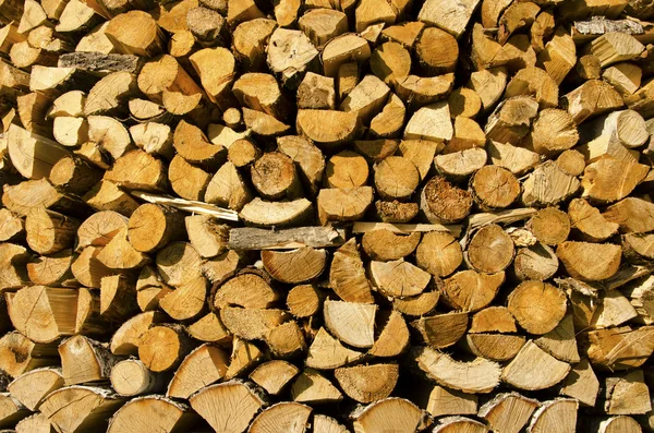 Background of stacked firewood — Stock Photo, Image