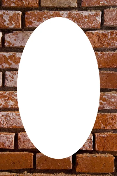 Kırmızı tuğla duvar parçası çerçeve izole beyaz oval — Stok fotoğraf