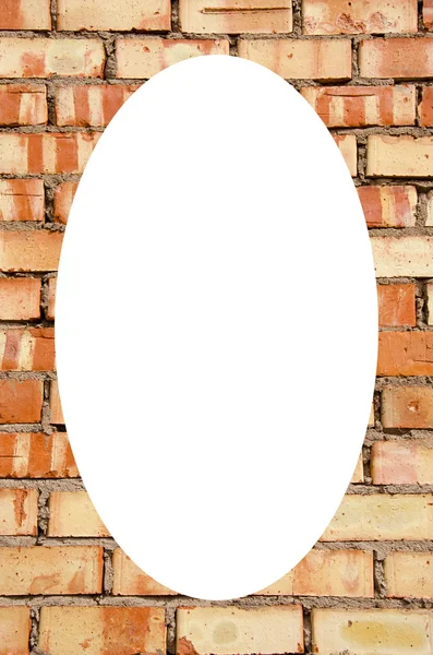Κόκκινο τούβλο πλαίσιο τοίχο και απομονωμένες άσπρο oval — Φωτογραφία Αρχείου