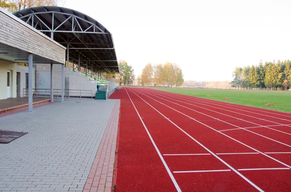 Athletics stadium running tracks football pitch — Stock Photo, Image