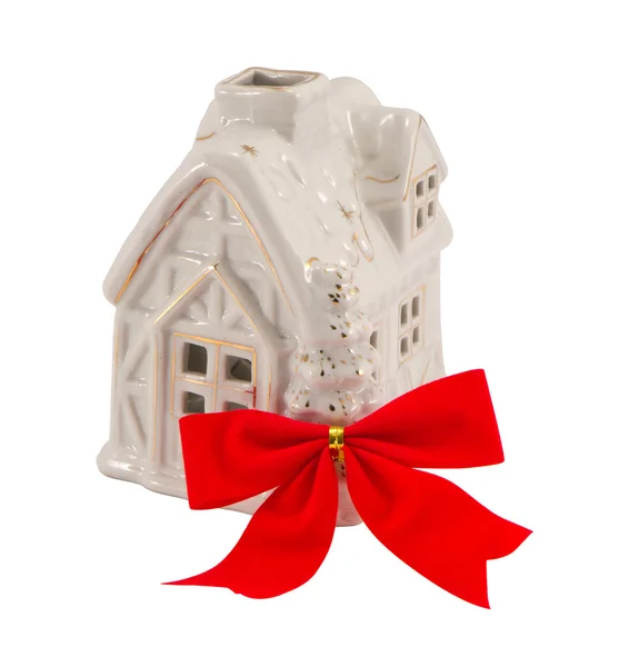 Små vita huset och röda band band. julklapp. — Stockfoto