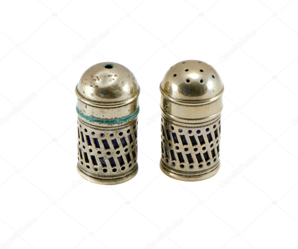 Retro silver salt and pepper isolated on white background. Kitchen objects.