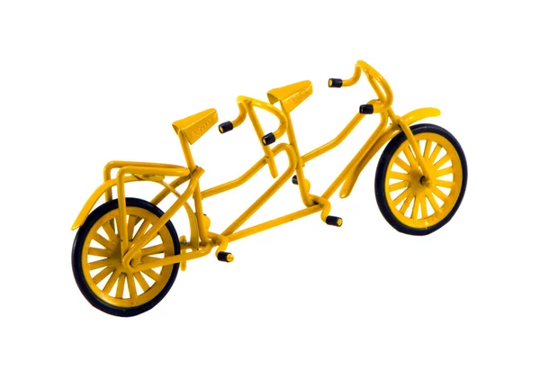 Decoração de brinquedo de bicicleta dupla isolada em branco — Fotografia de Stock